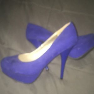 9 stilettos worn velvet blue